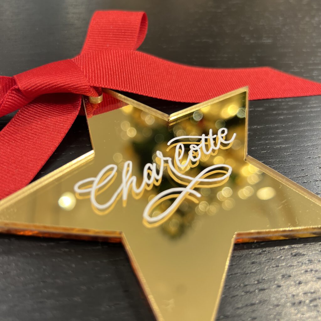Christbaumschmuck goldener Stern mit Namen