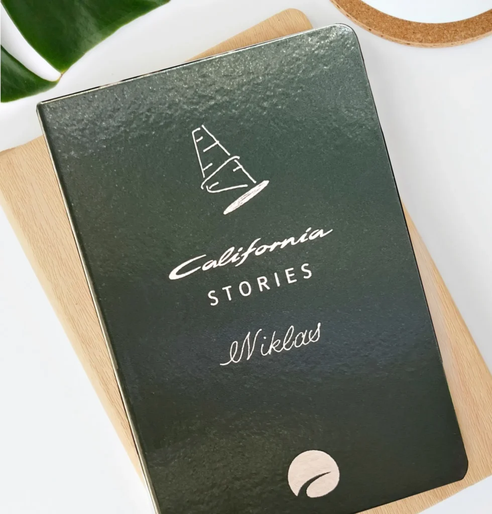 Notizbuch mit Personalisierung Live vor Ort mit weißem Hot Foiling